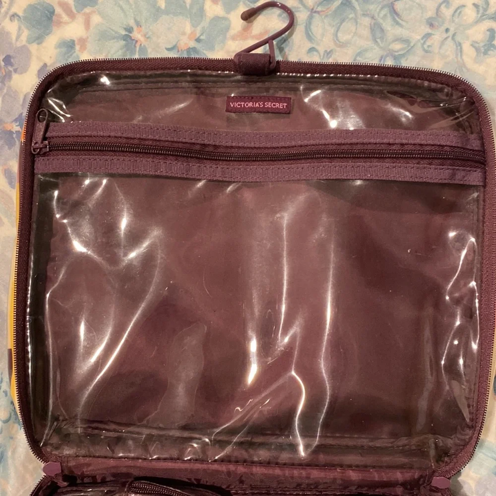 Victoria’s Secret travel case with removable pouches.